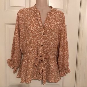 Feminine floral peplum blouse